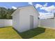 The backyard features a storage shed with white siding and green grass at 2506 Berleze Ct., Conway, SC 29527