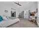 Spacious bedroom with flat screen television, cozy fireplace, and ensuite bathroom at 260 Palmetto Harbour Dr., North Myrtle Beach, SC 29582