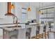 Modern kitchen features a large island, stainless steel appliances, and custom cabinets at 260 Palmetto Harbour Dr., North Myrtle Beach, SC 29582
