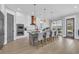 Well-equipped kitchen with an island, double ovens, and hardwood floors at 260 Palmetto Harbour Dr., North Myrtle Beach, SC 29582