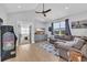 Spacious living room with hardwood floors, vaulted ceilings, and comfortable seating at 260 Palmetto Harbour Dr., North Myrtle Beach, SC 29582