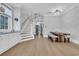 Spacious area showcasing a dining table and staircase with natural light at 260 Palmetto Harbour Dr., North Myrtle Beach, SC 29582