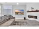Cozy living room with a modern fireplace and large screen tv at 260 Palmetto Harbour Dr., North Myrtle Beach, SC 29582