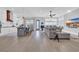 Open-concept living room combines kitchen, dining, and living areas with hardwood flooring at 260 Palmetto Harbour Dr., North Myrtle Beach, SC 29582
