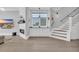 Comfortable living space features a fireplace, built-in cabinets, and a staircase at 260 Palmetto Harbour Dr., North Myrtle Beach, SC 29582