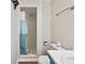 Bathroom featuring a walk-in shower, toilet, and sink with blue cabinets and laminate flooring at 2701 Hillside Dr. S # 1, North Myrtle Beach, SC 29582