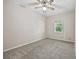 Bedroom with neutral walls, carpeted floor, and natural light from a window at 2701 Hillside Dr. S # 1, North Myrtle Beach, SC 29582