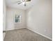 Bedroom with neutral walls, carpeted floor, a ceiling fan and natural light from a window at 2701 Hillside Dr. S # 1, North Myrtle Beach, SC 29582