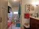 Bathroom featuring vanity with sink, toilet, and a walk-in shower at 2917 Chippenham Rd., Marion, SC 29571