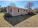 Tan siding and red shutters add charm to the exterior of this ranch-style home at 2917 Chippenham Rd., Marion, SC 29571