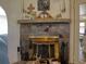 Close-up of a unique stone fireplace with decorative accents at 2917 Chippenham Rd., Marion, SC 29571
