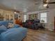 Comfortable living room with multiple seating areas and access to the outdoors at 2917 Chippenham Rd., Marion, SC 29571