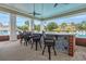Elegant poolside bar with wicker chairs offers a spot for refreshments and socializing at 2993 Moss Bridge Ln., Myrtle Beach, SC 29579