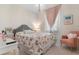 Charming bedroom with a floral quilt and pastel accents featuring soft, natural light at 315 Cattle Drive Circle, Myrtle Beach, SC 29588
