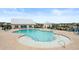 Upscale community pool area with lounge chairs and Gathering-friendly amenities at 315 Cattle Drive Circle, Myrtle Beach, SC 29588