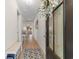 Bright entryway with light wood floors, elegant decor, and a view into the living area at 315 Cattle Drive Circle, Myrtle Beach, SC 29588