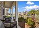 Relaxing front porch with comfortable seating and views of a landscaped front yard at 315 Cattle Drive Circle, Myrtle Beach, SC 29588