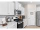 Well-equipped kitchen featuring stainless steel appliances, a gas range, and ample counter space at 315 Cattle Drive Circle, Myrtle Beach, SC 29588