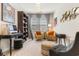 Stylish home office featuring a desk, bookcase, and comfortable seating area at 315 Cattle Drive Circle, Myrtle Beach, SC 29588