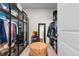Spacious walk-in closet with ample storage, modern lighting, and a mirrored dressing area at 315 Cattle Drive Circle, Myrtle Beach, SC 29588