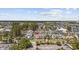 Aerial view showcases the community layout with colorful townhomes, green spaces, and parking at 3550 Pampas Dr. # 2, Myrtle Beach, SC 29577