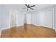 Spacious bedroom features hardwood floors, ceiling fan, and easy access to a full ensuite bathroom at 3550 Pampas Dr. # 2, Myrtle Beach, SC 29577