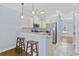 Eat-in kitchen with granite counters, stainless steel appliances, and white cabinetry at 3550 Pampas Dr. # 2, Myrtle Beach, SC 29577