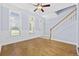 Charming living area with natural light, hardwood floors and staircase access at 3550 Pampas Dr. # 2, Myrtle Beach, SC 29577