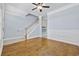 Bright, open living room with hardwood floors, a staircase, and crown molding at 3550 Pampas Dr. # 2, Myrtle Beach, SC 29577