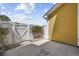 A fenced patio area that has a concrete floor with bushes and rock accents at 3550 Pampas Dr. # 2, Myrtle Beach, SC 29577