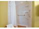 Accessible shower with grab bar, built-in shelves, and tiled walls at 417 Pennington Loop, Myrtle Beach, SC 29588