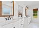 A well-appointed bathroom with double sinks, quartz countertops, and modern fixtures at 4426 Still Pond Rd., Conway, SC 29526