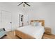 Cozy bedroom with neutral decor, natural wood accents, and ample natural light at 4426 Still Pond Rd., Conway, SC 29526