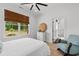 Bright bedroom with a ceiling fan, natural light, and a serene view of the outdoors at 4426 Still Pond Rd., Conway, SC 29526