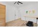 Exercise room with a treadmill, desk, and three pictures displayed on the wall at 4426 Still Pond Rd., Conway, SC 29526