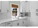 Charming kitchen with white cabinets, modern appliances, and a bright window at 4426 Still Pond Rd., Conway, SC 29526