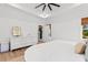 Bright bedroom featuring hardwood floors, natural light, and white trim at 4426 Still Pond Rd., Conway, SC 29526