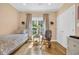 Sunny bedroom featuring hardwood floors, a window, and a neutral color scheme at 455 Dornoch Dr., Pawleys Island, SC 29585