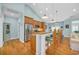 Bright eat-in kitchen with stainless appliances, breakfast bar and hardwood flooring at 455 Dornoch Dr., Pawleys Island, SC 29585