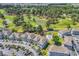 Community aerial featuring condos, golf course, and pond offering a scenic and peaceful setting at 4773 Wild Iris Dr. # 301, Myrtle Beach, SC 29577