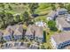 Aerial view of condos, pool, and golf course, creating a scenic living experience at 4773 Wild Iris Dr. # 301, Myrtle Beach, SC 29577
