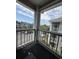 A balcony view overlooking the parking lot and surrounding condo complex at 4773 Wild Iris Dr. # 301, Myrtle Beach, SC 29577