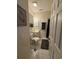 A clean bathroom with a toilet, sink, and shower with good lighting and fixtures at 4773 Wild Iris Dr. # 301, Myrtle Beach, SC 29577