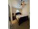 A cozy bedroom featuring a ceiling fan and carpeted floors at 4773 Wild Iris Dr. # 301, Myrtle Beach, SC 29577