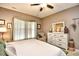 Bedroom with ceiling fan, large window and dresser at 512 Chanted Dr., Murrells Inlet, SC 29576