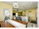 Open dining room with view of kitchen and living room at 512 Chanted Dr., Murrells Inlet, SC 29576