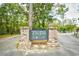Welcoming entrance to The Park at Prince Creek West, surrounded by lush greenery and mature trees at 512 Chanted Dr., Murrells Inlet, SC 29576