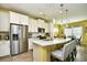 Modern kitchen with stainless steel appliances, subway tile backsplash, and a spacious island with bar seating at 512 Chanted Dr., Murrells Inlet, SC 29576