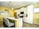 Modern kitchen with stainless steel appliances, subway tile backsplash, and a spacious island with bar seating at 512 Chanted Dr., Murrells Inlet, SC 29576