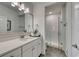 Modern bathroom features a sleek vanity, decorative plants, and tiled walk-in shower at 543 Oak Landing Dr., Myrtle Beach, SC 29588